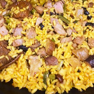 Arroz de secreto ibérico, setas, ajos tiernos y trufas