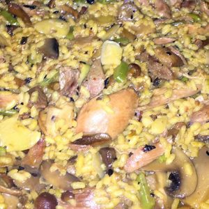 Arroz de pato, setas y ajos tiernos